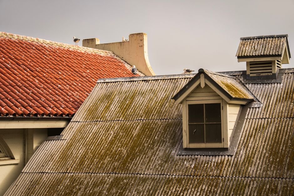 metal roof leaking around chimney